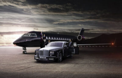 Private Jet Beside A Black Car